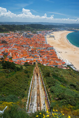 Panoramic View of Nazare Coastal Town with Red Rooftops and Atlantic Ocean in Portugal