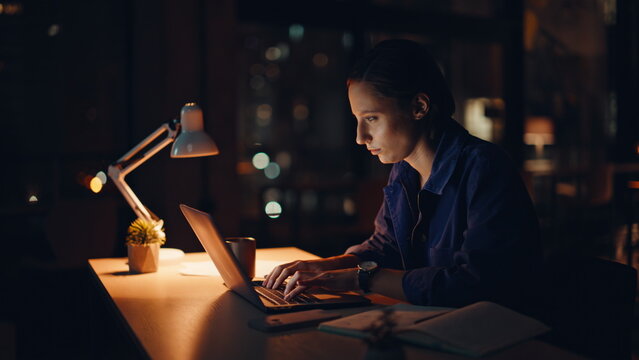 Fototapeta Woman workaholic typing laptop at night office closeup. Tired accountant work 