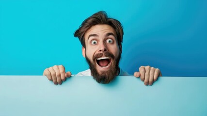 The  features a joyful man with his hands on a wall, expressing an exaggerated surprise or excitement. His blue background adds to the vibrancy of the scene.