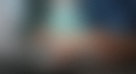 Soft, diffused light creating a warm, abstract gradient background with subtle tones.