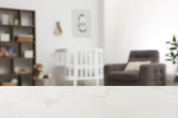 Baby room with empty white marble table. Space for design