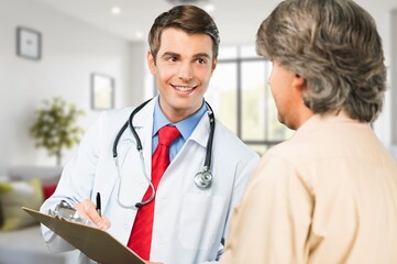 Fototapeta premium Clinic patient and doctor in modern hospital office