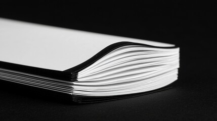 A black and white image of a book.