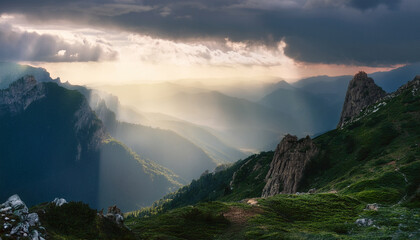 Misty Mountains Sun Rays Pierce The Clouds