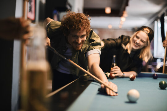 Playing pool with friends