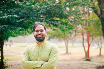 A close-up portrait of an Indian man wearing a traditional kurta. Represents Indian culture, heritage, ethnic fashion, and traditional clothing style