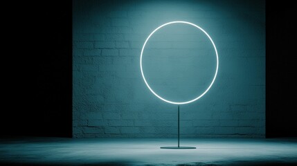 A neon light ring lamp with a circular light ring and a black base.