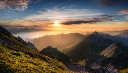 Sunrise In The Mountains With Cloudy Sky Background