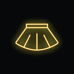 Neon sign showing a skirt glowing on a wall in the dark