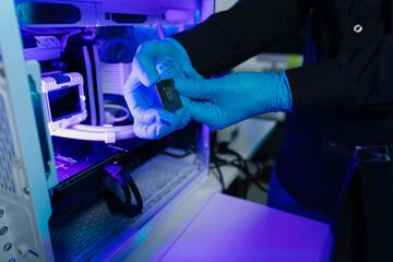 Hands repairing electronic devices. Electronic technician.