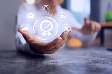 Quality assurance concept with businessman holding a certified mark represent to preventing defects and ensuring products or services consistently to meet customer requirement