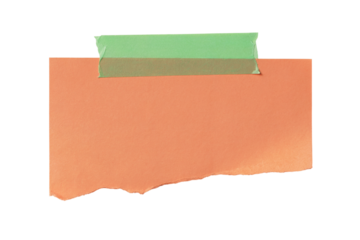 orange torn memo pad held by green tape isolated on white background