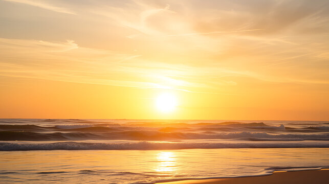 Golden Beachfront Horizon: Capture the serenity of a beach landscape during a radiant sunrise. Gentle waves caress the shore, while the sky is awash with golden hues and wispy clouds