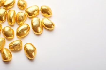 Gold nuggets creating wealth and luxury on white background