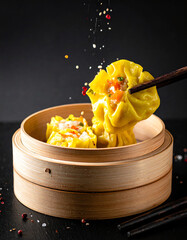 Delicious Asian Dumplings Served in a Bamboo Steamer