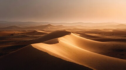 Naklejka premium Golden Dunes of the Sahara Desert at Sunset with Warm Light and Serene Atmosphere