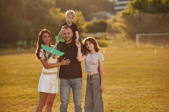 Fototapeta Photo of happy family with husband, wife and two kids