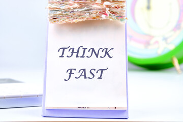 THINK FAST words the inscription on the calendar with tear-off leaves