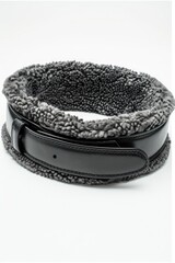 A wide black leather belt with a thick gray fleece lining is displayed on a white background. The belt is shown lying flat