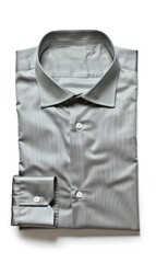 A neatly folded, light grey, long-sleeved dress shirt with a subtle textured pattern lies flat against a white background.  The shirt's collar is folded up, and the cuffs are visible