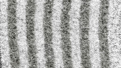 black and white striped textured pattern abstract fabric with detailed fuzzy weave for commercial background or wallpaper