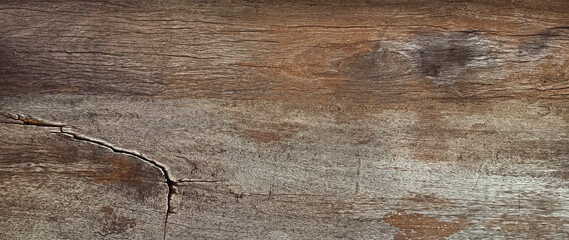 Old grunge dark textured wooden background with deep. rich brown tones, surface of aged wood,...