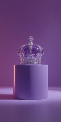 A regal purple crown sits atop a cylindrical pedestal, creating a sophisticated and elegant presentation.