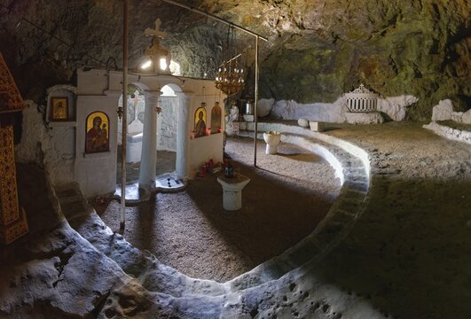 Cave church of St John Vrykountas with icons and altars, which conveys a calm, spiritual atmosphere, hike to the ancient Doric city of Vrougounda and the cave church of St John Vrykountas, Avlona, Karpathos, Greece