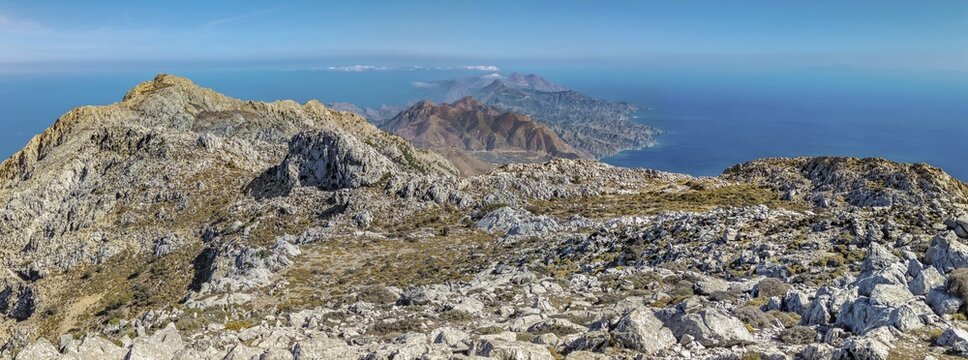View from the summit of Kali Limno over the rocky mountain landscape of northern Karpathos with the sea under a clear blue sky, hike to the summit of Kali Limni, Kali Limni, Lastos, Karpathos, Greece