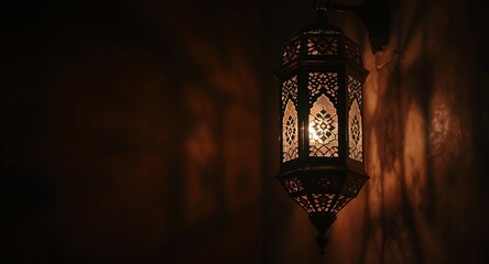 Warmly Lit Ornate Traditional Lantern Casting Intricate Shadow Patterns on a Dark Wall, Decorative Light Source