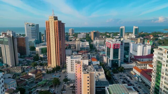 Drone Aerial of Dar es Salaam City Skyline with Old Buildings under Cloudy Sky in Tanzania