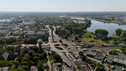 Drone photo of traffic roads, river Warta and green areas in Poznan