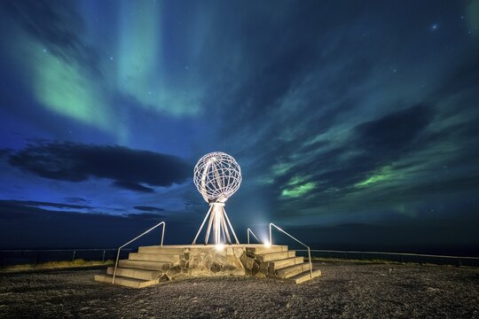 Northern Lights at the North Cape with steel globe, Nordkapp, Finnmark, Norway