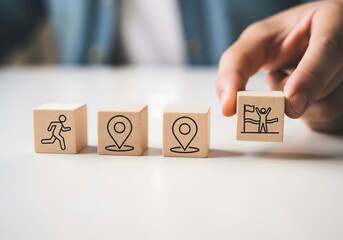 A hand arranging wooden blocks featuring business and success icons transparent background