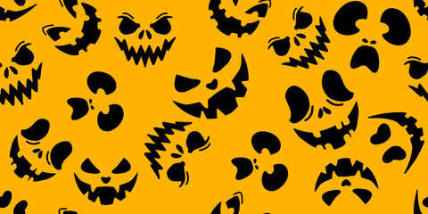 Fototapeta premium Flat vector seamless Halloween pattern of creepy black silhouette faces with scary smiles on bright yellow backdrop for festive design elements.