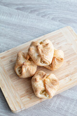 Homemade apple puff pastries with flaky crust