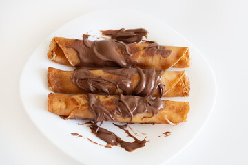 Rolled Pancakes with Melted Chocolate