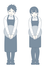 お辞儀をしながら微笑む飲食店員