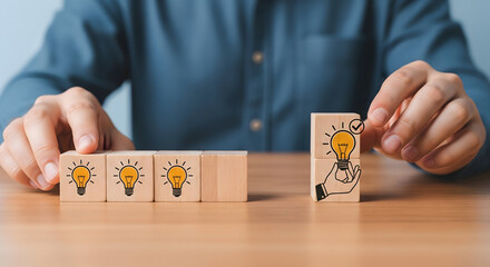 Brilliant ideas emerging with creative lightbulb concepts on wooden blocks