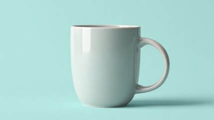 Fototapeta premium White ceramic coffee mug mockup on light blue background