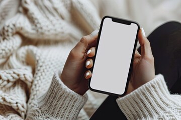 Womans Hand with White Painted Fingernails Holds Phone with White Screen