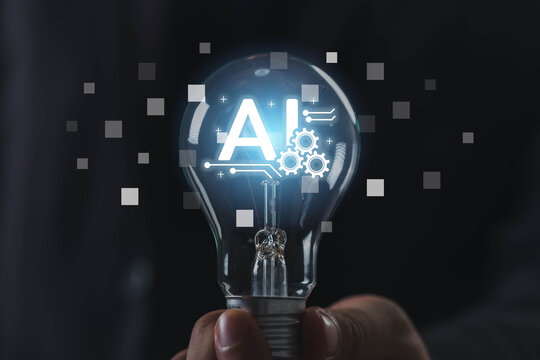 Creative concept of artificial intelligence symbol inside a light bulb, representing machine learning, innovation, automation, digital transformation, and future technology solutions. - Powered by Adobe