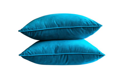 Two teal pillows stacked together showcasing soft