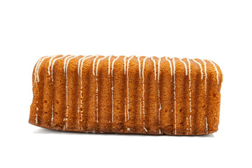 Whole cake loaf, close-up. Golden sponge loaf cake with white icing stripes, presented on a white background. Fluffy and sweet bakery treat. The image is isolated on a transparent PNG background.