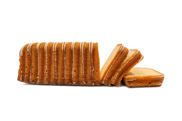 Golden loaf cake with slices fanned out, topped with white icing drizzle, isolated on a white background. Soft and tasty dessert. The image is isolated on a transparent PNG background.