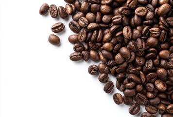 Obraz premium Small coffee beans scattered on a white background