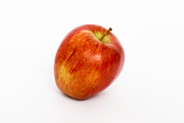 A vibrant red apple isolated on a clean white background.