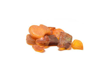 Amber stone  rough unpolished closed up isolated on white 