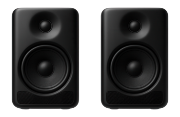 Two black speakers in a minimalist audio setup.