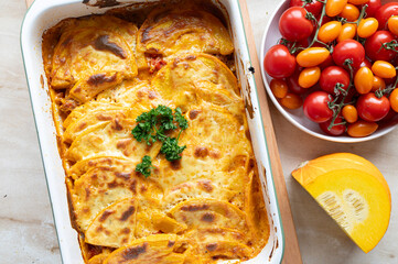 Delicious squash, minced meat casserole fresh and homemade cooked in a casserole dish